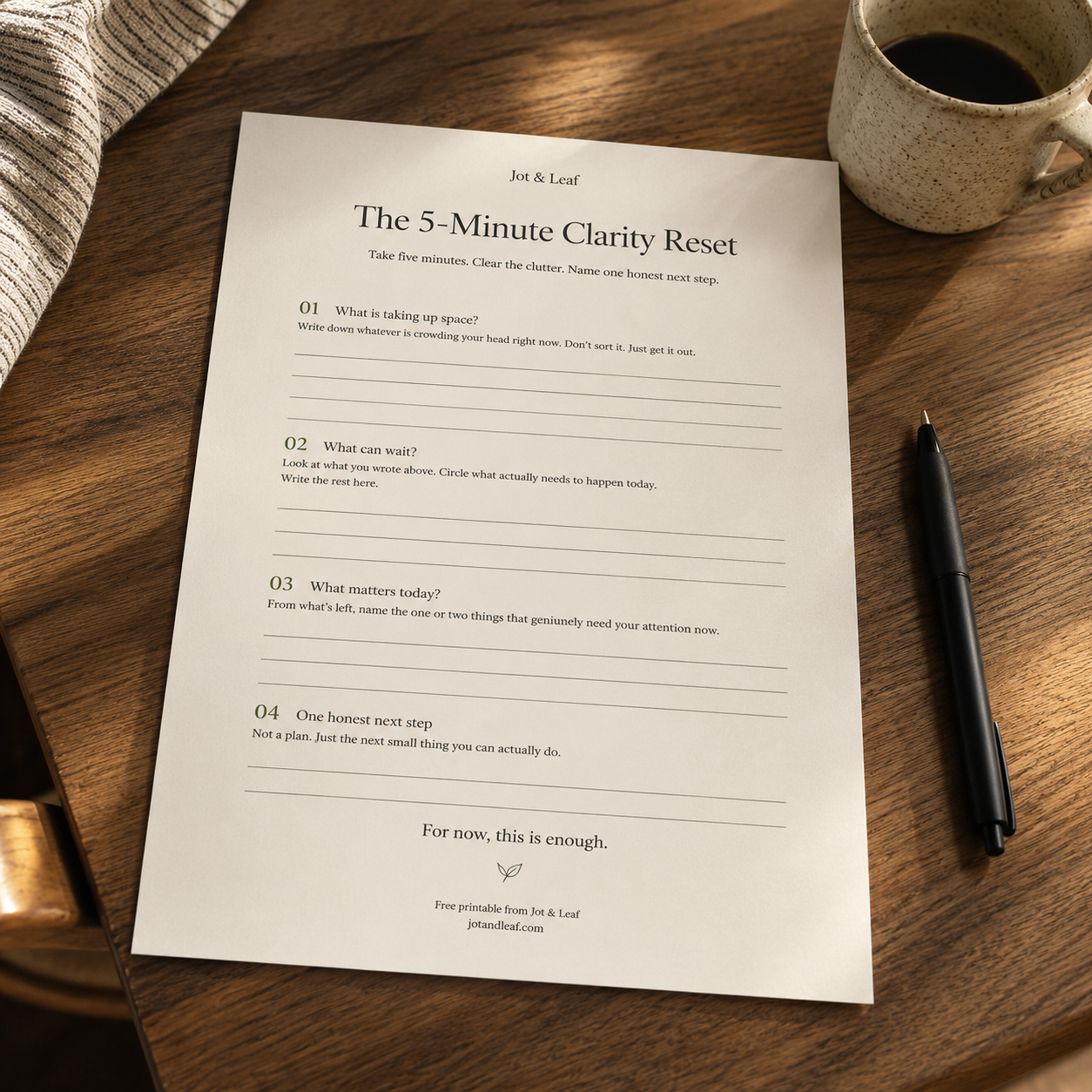 The 5-Minute Clarity Reset worksheet on a desk with a pen