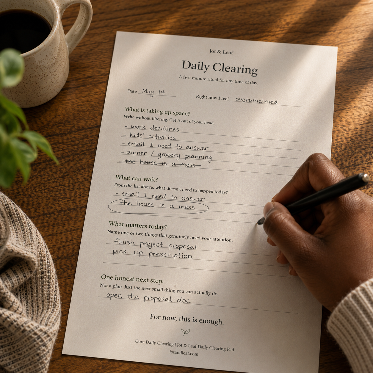 A hand writing on the Jot and Leaf Daily Clearing worksheet
